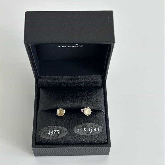 Topaz (5/8 ct. t.w.) Stud Earrings in 14K White Gold - Picture 1 of 4